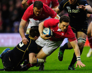 Wales' George North is taken down by Scotland's Sean Lamont, Scotland v Wales, Six Nations, Murrayfield, Scotland, March 9, 2013