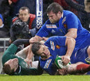 France's Louis Picamoles secures the ball as Ireland's Keith Earls is bundled into touch