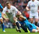 England's Chris Ashton gets hauled down inches from the try line