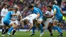 England's Billy Twelvetrees is tackled by Italy's Alessandro Zanni