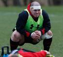 Wales' Paul James watches on in training