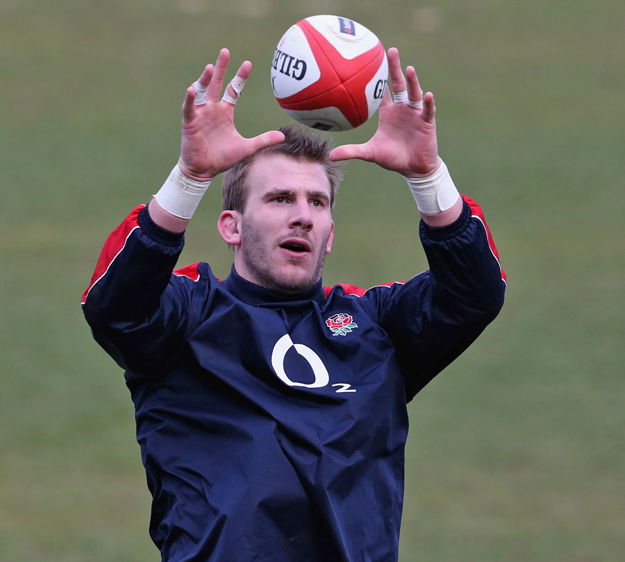 England's Tom Croft claims a ball in training