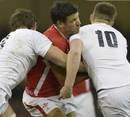 England's Owen Farrell and Tom Wood connect with Mike Phillips