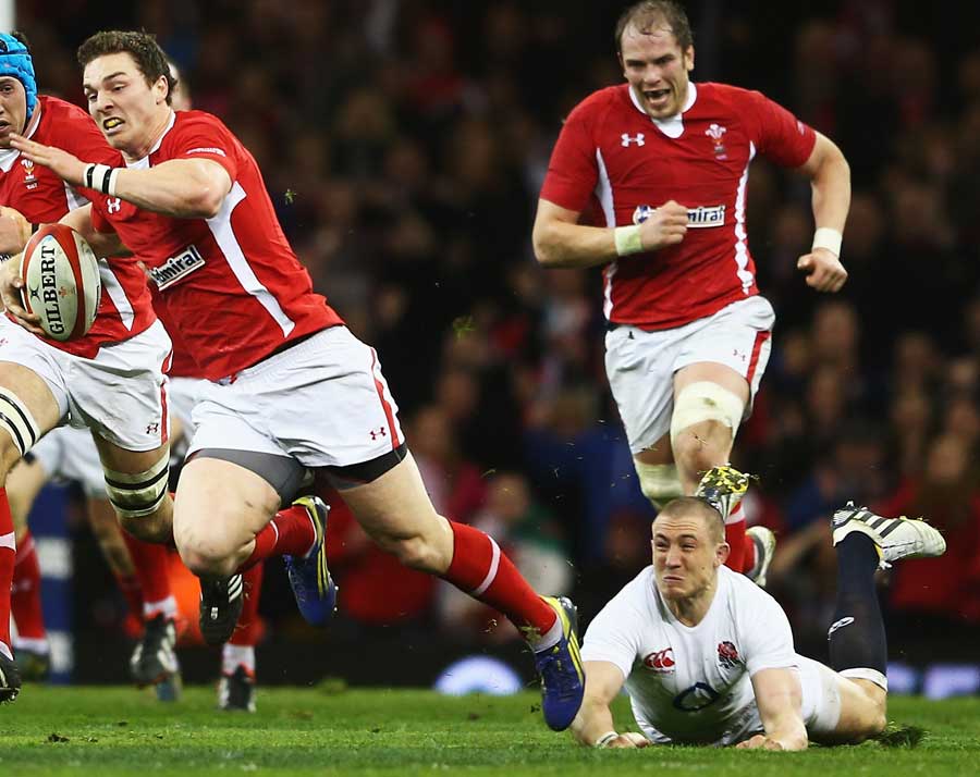 England's Mike Brown tap tackles George North