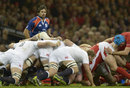 Referee Steve Walsh oversees a scrum during the clash between England and Wales