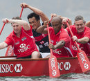 Former internationals Jonathan Davies, George Gregan and Gavin Hastings take part in a dragon boat race