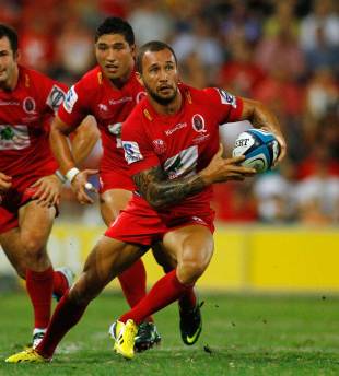 The Reds' Quade Cooper runs the ball against the Bulls, Queensland Reds v Bulls, Super Rugby, Suncorp Stadium, Brisbane, March 23, 2012