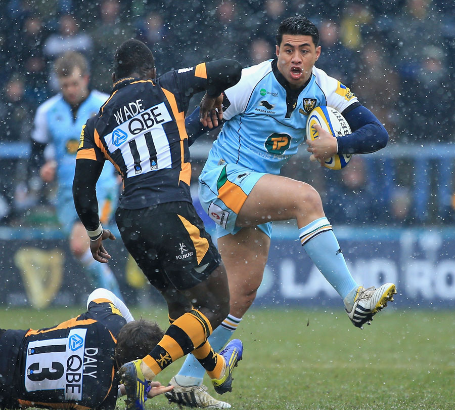 Northampton's George Pisi takes on the Wasps defence