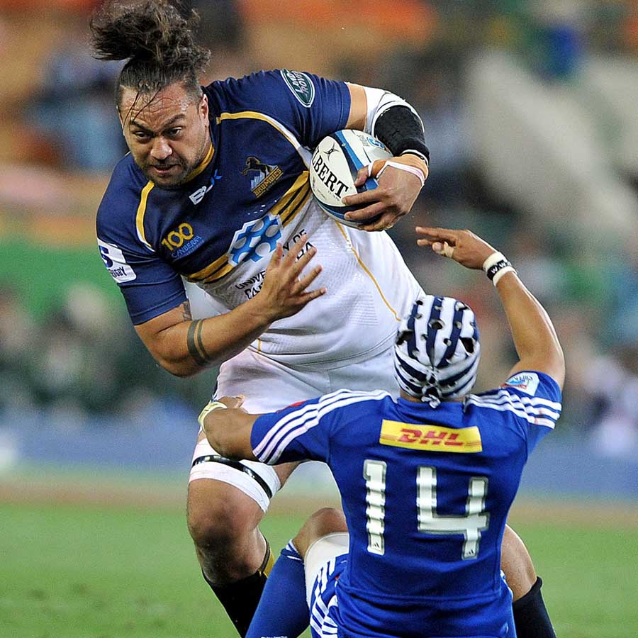 The Brumbies' Fotu Auelua charges over the Stormers' Gio Aplon