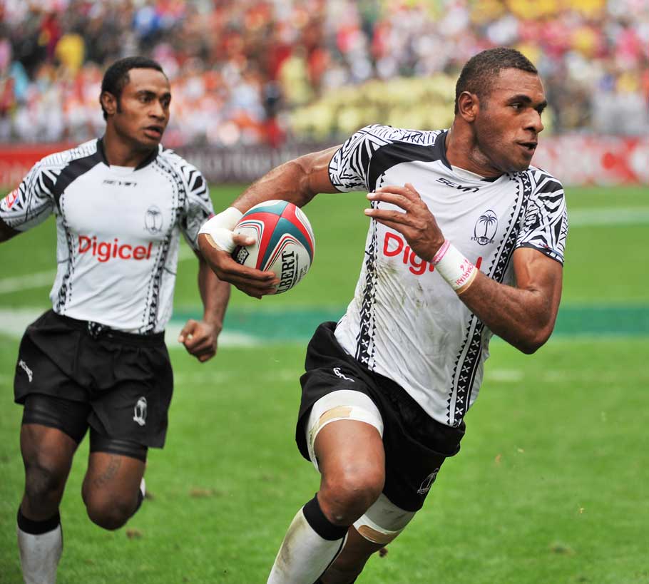Fiji's Jasa Veremalua scores a try against Spain during the Hong Kong Sevens