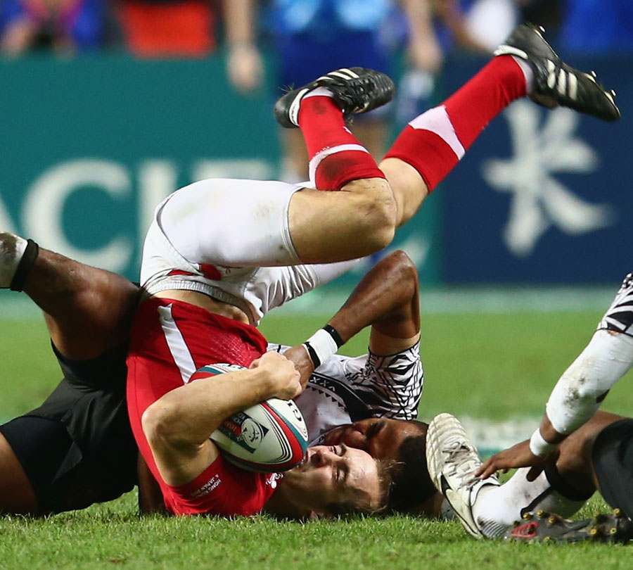 Fiji's Ilai Tinai  tackles Wales' Lee Williams