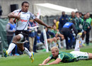 Fiji's Benito Masilevu races down the touchline against South Africa