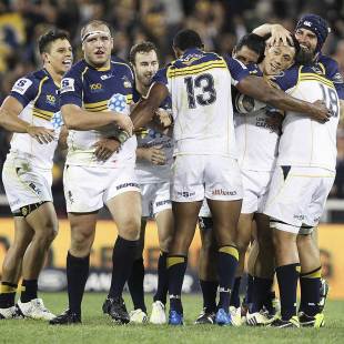 The Brumbies' Christian Lealiifano is congratulated by team-mates after kicking a penalty goal to beat the Bulls, Brumbies v Bulls, Super Rugby, Canberra Stadium, Canberra, March 30, 2013 