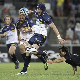 Brumbies' forward Ben Mowen skips through a tackle, Brumbies v Southern Kings, Super Rugby, Canberra Stadium, Canberra, April 5, 2013