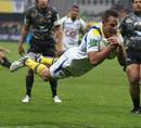 Clermont's Lee Byrne takes flight for his score