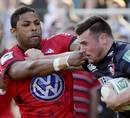 Leicester's Adam Thompstone does his best to fend off Delon Armitage