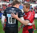 Toulon's Jonny Wilkinson consoles Leicester's Toby Flood