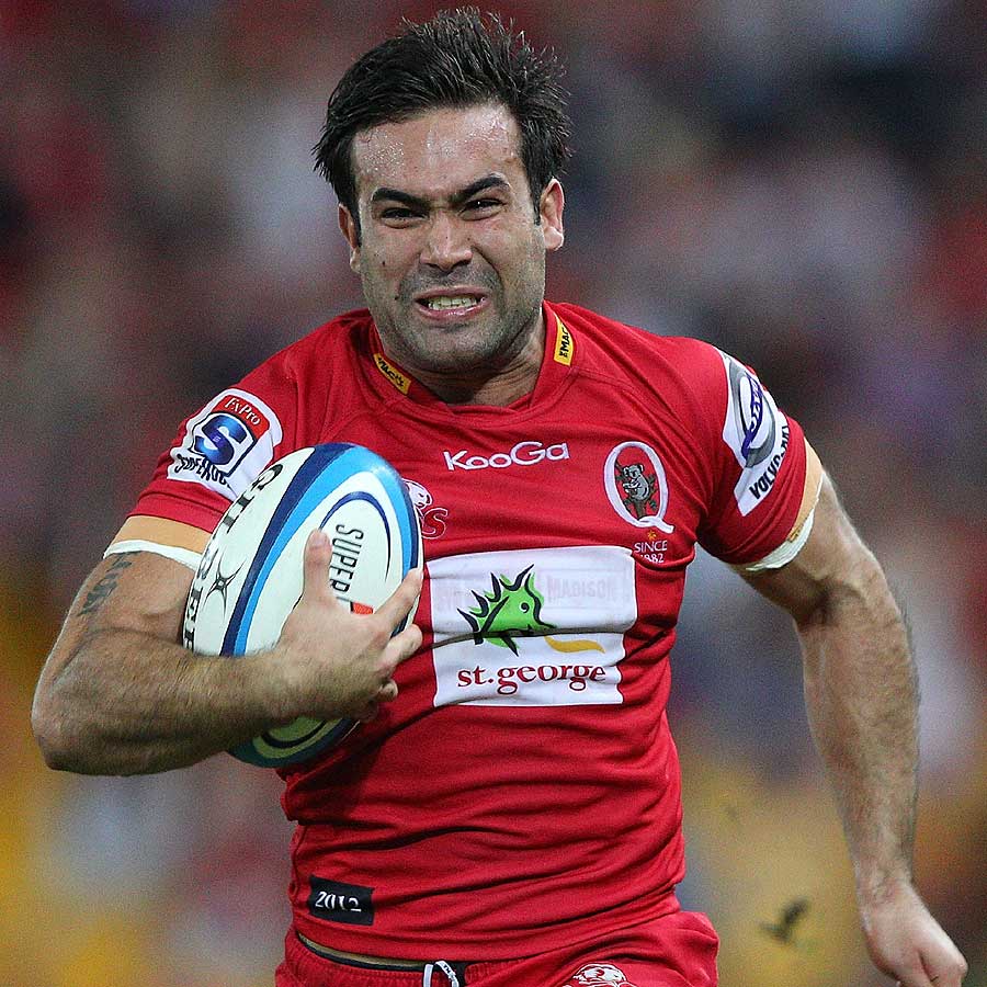 Queensland Reds winger Rod Davies hits full pace