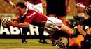 British & Irish Lions' Rob Howley goes over for the try
