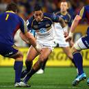 Brumbies' centre Christian Lealiifano hits the line