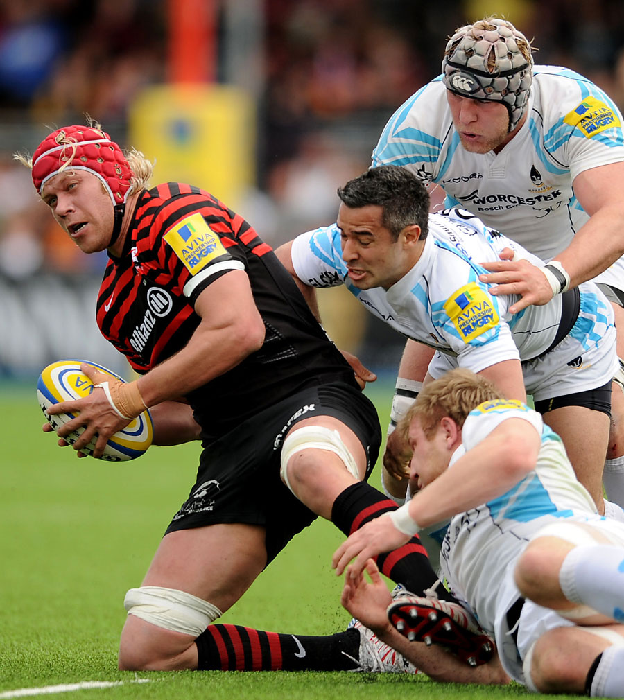 Saracens' lock Mouritz Botha is felled by Worcester