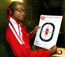 Colin Charvis looks pleased with his efforts at the shooting range