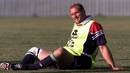Lawrence Dallaglio relaxes in training