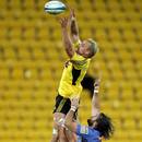 Mark Reddish of the Hurricanes wins a line-out ball 