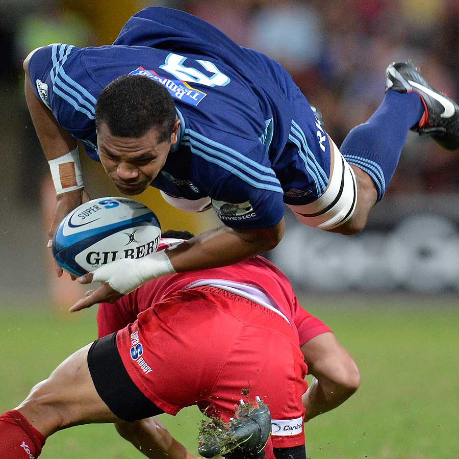 Blues No. 8 Peter Saili gets upended in a tackle