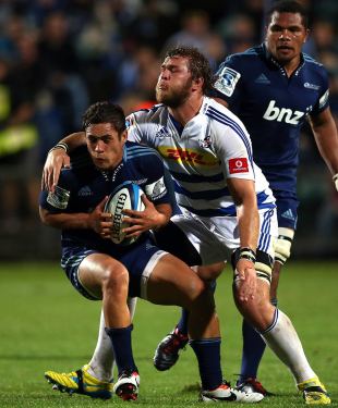 Jackson Willison of the Blues is tackled by Duane Vermeulen of the Stormers, Super Rugby, Round 12, Blues v Stormers, North Harbour Stadium, Auckland, May 3, 2013