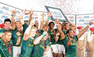 South Africa celebrates after beating New Zealand in the final of the IRB Sevens Series event held at Outeniqua Park in George, South Africa on December 6, 2008.