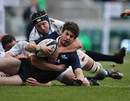 Oxford University's Sean Morris is tackled by Cambridge University's Martin Wilson