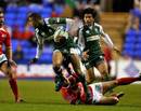 London Irish's Delon Armitage is tackled by Dax's Laurent Diaz