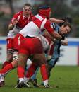 Cardiff Blues' Jason Spice is tackled by the Biarritz defence