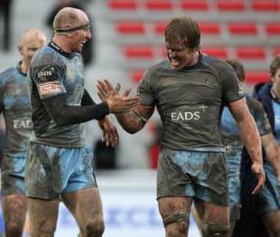 Cardiff Blues' Gareth Thomas and Andy Powell celebrate victory over Biarritz following their Heineken Cup clash at Parc des Sports Aguilera in Biarritz, France on December 13, 2008. 