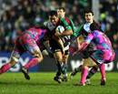Harlequins' Tani Fuga is stopped by Stade Francais' Sergio Parisse 