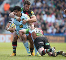 Northampton's Ken Pisi is tackled by the Quins defence