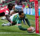 South Africa's Paul Delport dives over to score a try