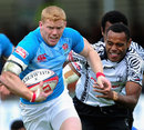 England's John Brake slips through Fiji's defence