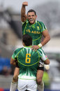 South Africa's Chris Dry (top) and Pieter Engelbrecht celebrate winning the Glasgow 7s