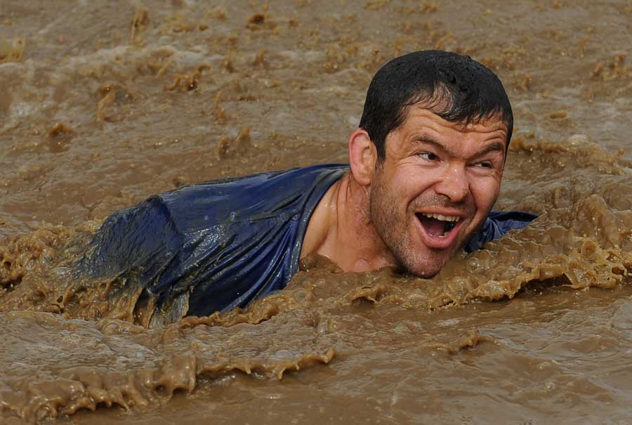 Andy Farrell takes part in Tough Mudder 2013 at Boughton House