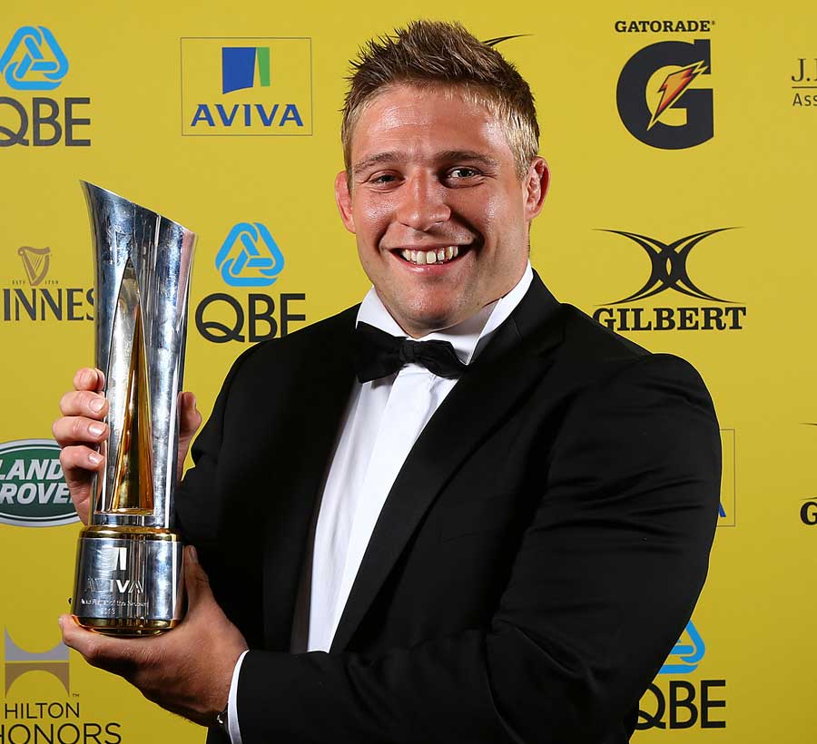 Tom Youngs celebrates with the Aviva Premiership Player of the Year trophy