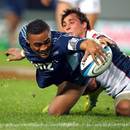 The Blues' Francis Saili scores a try against the Rebels
