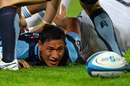 The Waratahs' Israel Folau eyes the ball against the Stormers