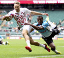 England's Christian Lewis-Pratt stretches the Fiji defence
