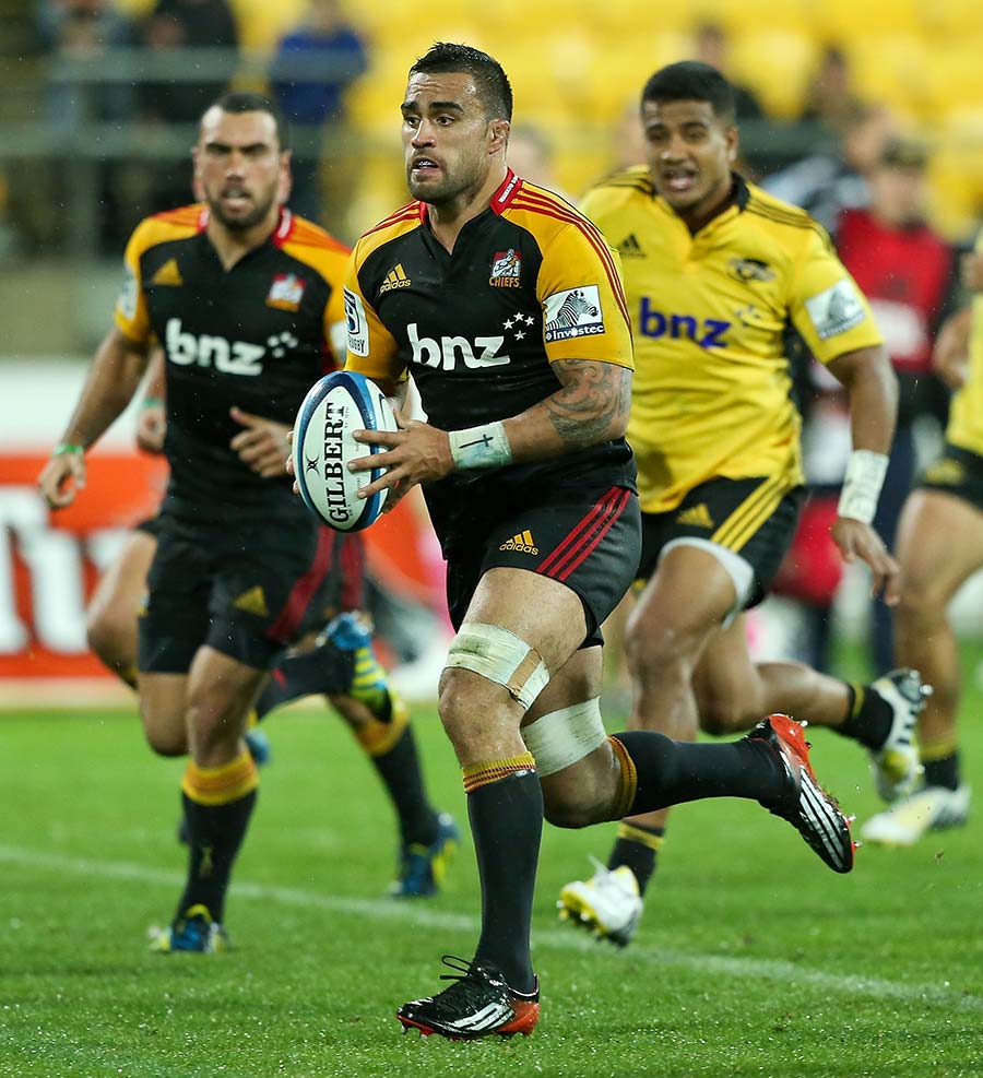 Chiefs captain Liam Messam charges forward against the Hurricanes