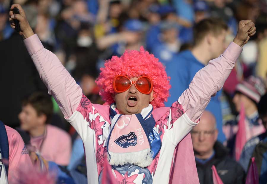 A Stade Francais supporter soaks in the atmosphere