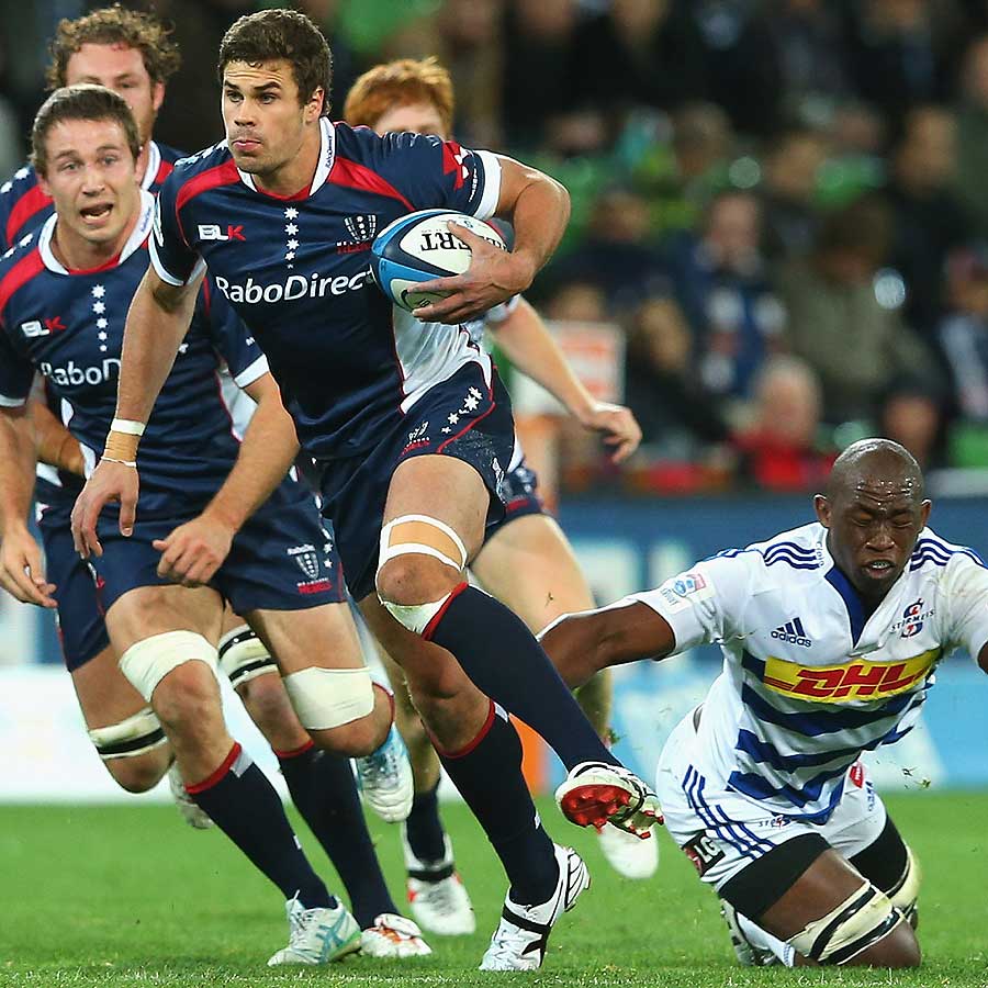 Tom English of the Rebels breaks through a Stormers tackle, Melbourne Rebels v Stormers, Super Rugby, AAMI Park, Melbourne, May 17, 2013