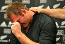 Ali Williams is comforted by All Blacks coach Steve Hansen as he announces his international retirement