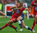 Toulon's Jonny Wilkinson is shackled by the Castres defence